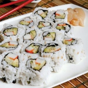 Raw Sushi California Roll on White Plate Food Picture