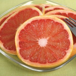 Re Grapefruit Slices on a Glass Plate with a Fork Food Picture