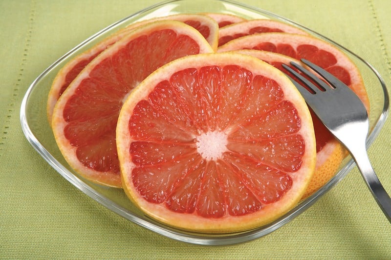 Re Grapefruit Slices on a Glass Plate with a Fork Food Picture
