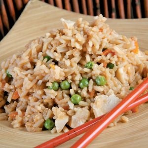 Thai Rice with Orange Chopsticks on Wooden Plate Food Picture