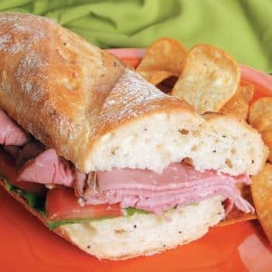 Roast Beef Sandwich on a Red Plate Food Picture