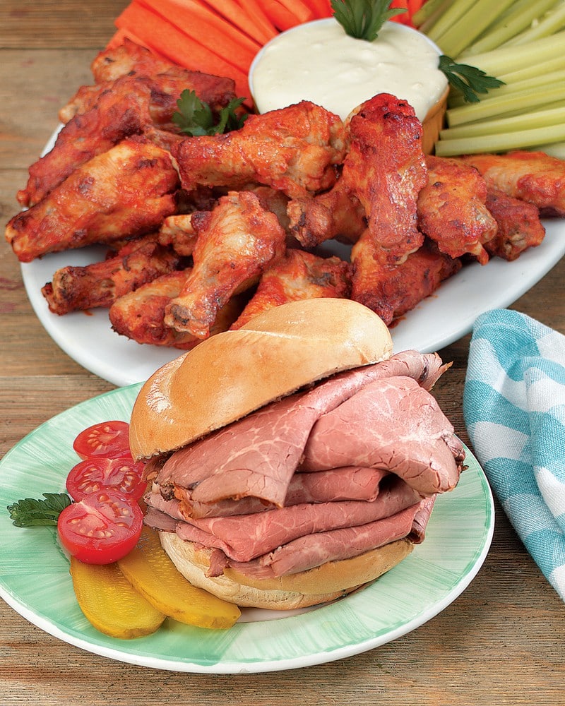 Roast Beef Sandwich on Green and White Plate and Wings Platter Food Picture