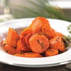 Roasted Thyme Carrots in a Deep Plate Food Picture