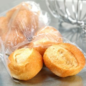 Bag of Dinner Rolls on Table Food Picture
