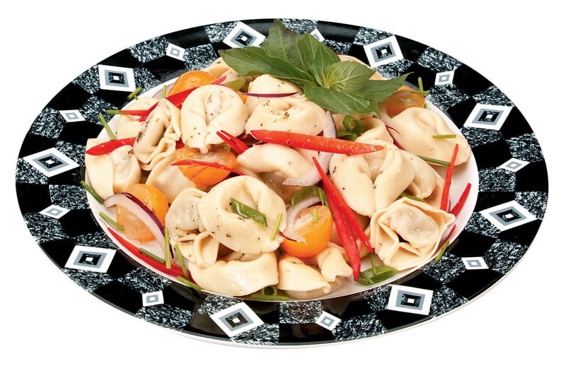 Tortellini Salad with Garnish on Black and White Plate Food Picture