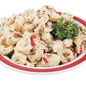 Tortellini Salad on Red and White Plate with Garnish Food Picture