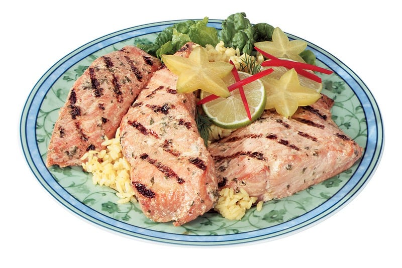 Grilled Salmon Filled over Rice with Garnish Food Picture
