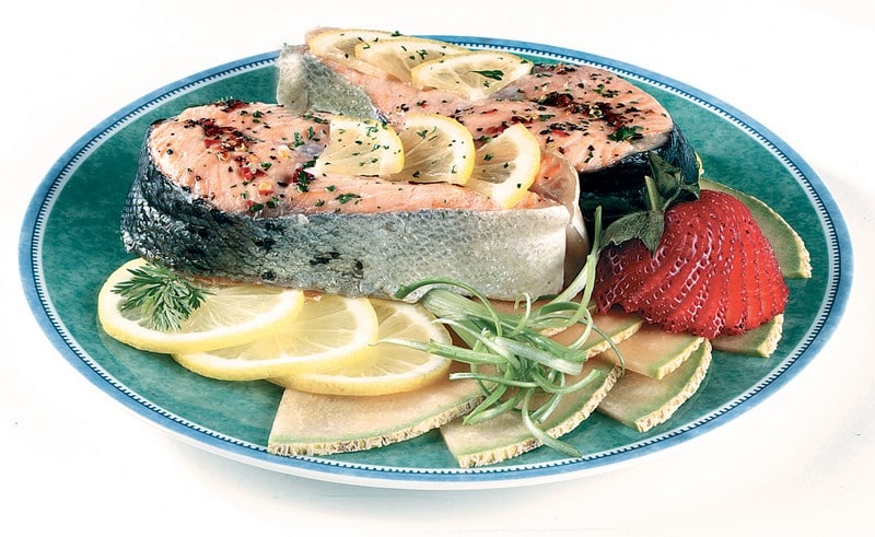Salmon Steak over Fruit on Colorful Plate Food Picture
