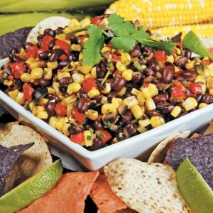 Corn Bean Salsa in White Dish with Corn Tortilla Chips Food Picture