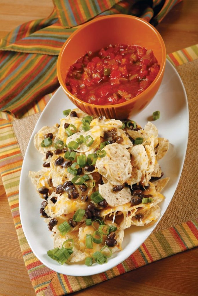 Nachos with Salsa on White Dish Food Picture