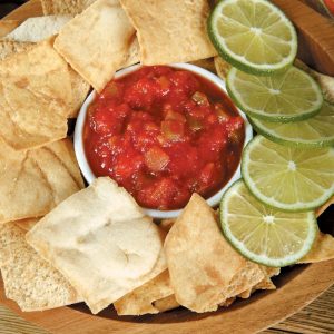 Pita Chips with Salsa and Lime Wheels in Wooden Bowl Food Picture