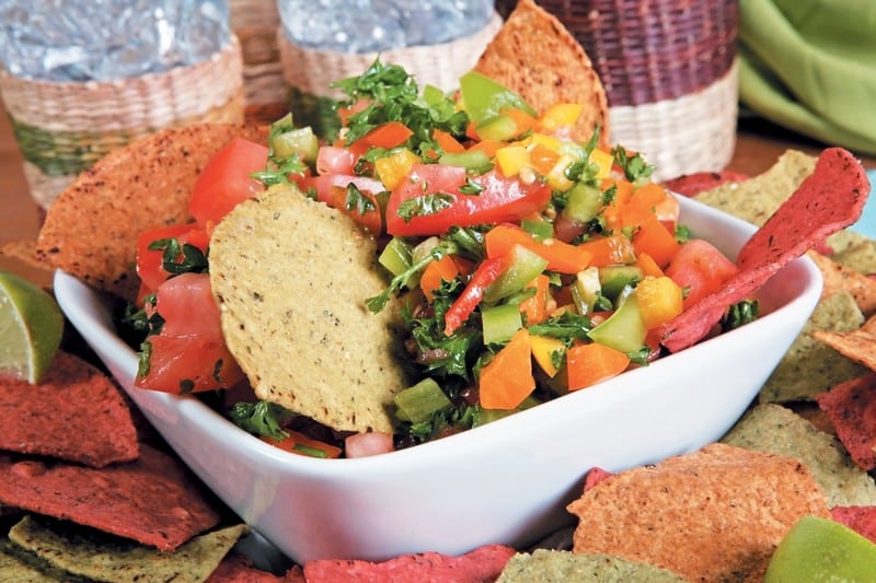 Tortilla Chips in Salsa in White Bowl Food Picture