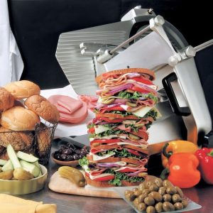 Stacked Sandwich with Sides and Garnishes and Deli Slicer Food Picture