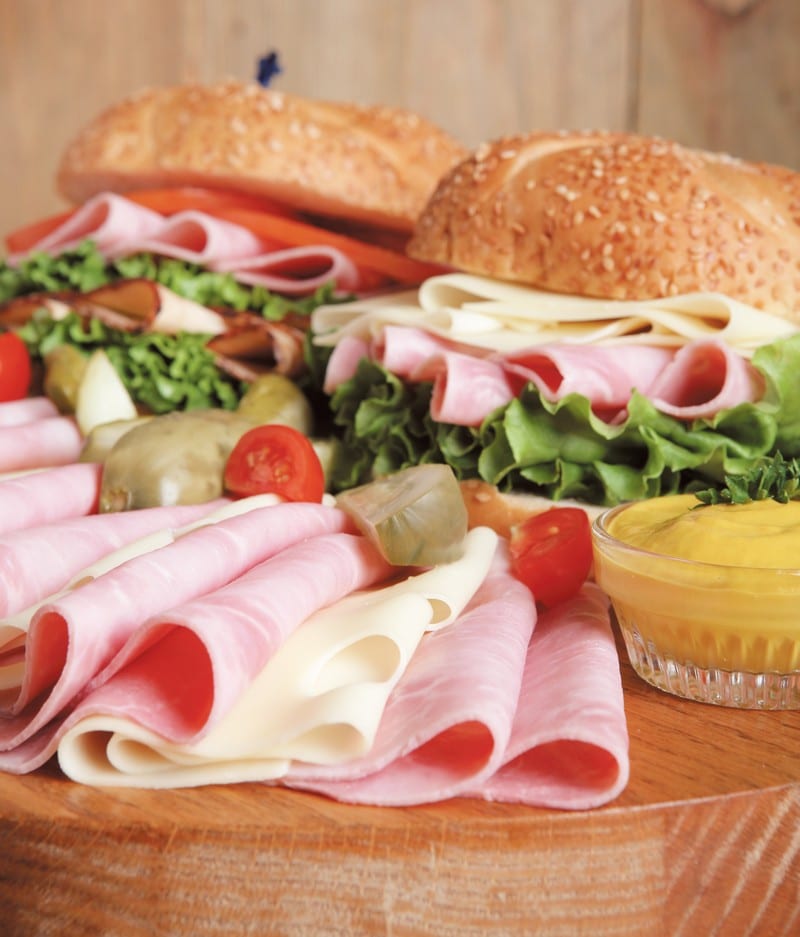 Sandwiches on Cutting Board with Cold Cuts Food Picture