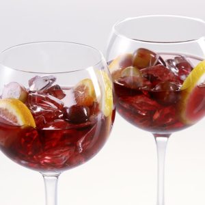 Two Glasses of Red Sangria with Lemons & Grapes Food Picture