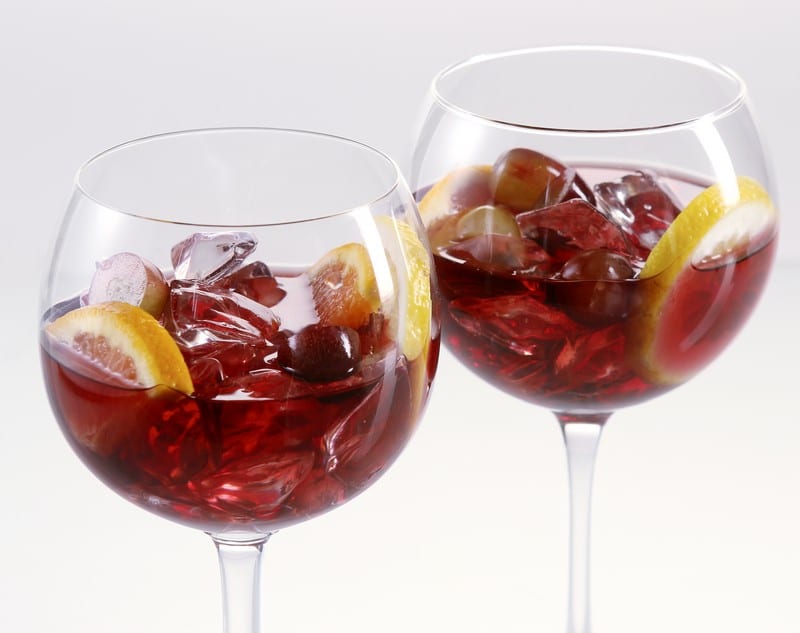 Two Glasses of Red Sangria with Lemons & Grapes Food Picture