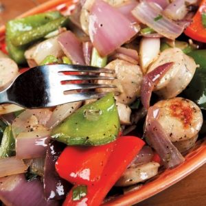 Sausage Peppers and Onions in Dish with Fork Food Picture