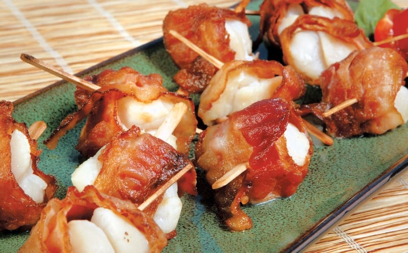 Scallops Wrapped in Bacon with Toothpicks on Green Plate Food Picture
