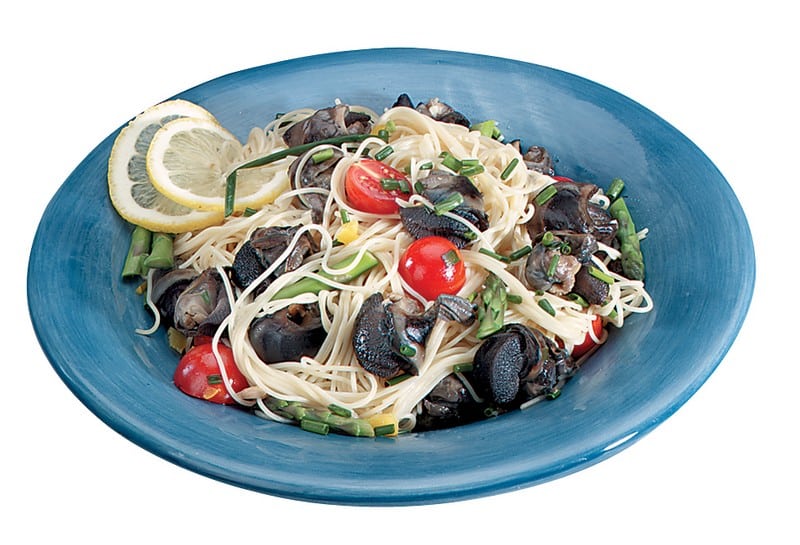 Scungilli Salad on Dark Blue Plate Food Picture