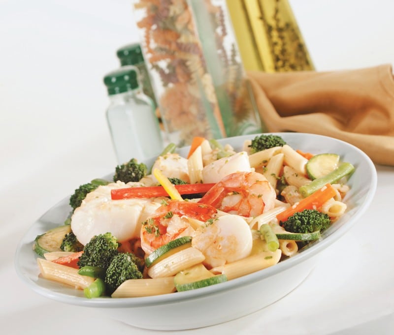 Seafood Assortment Over Pasta With Veggies Food Picture