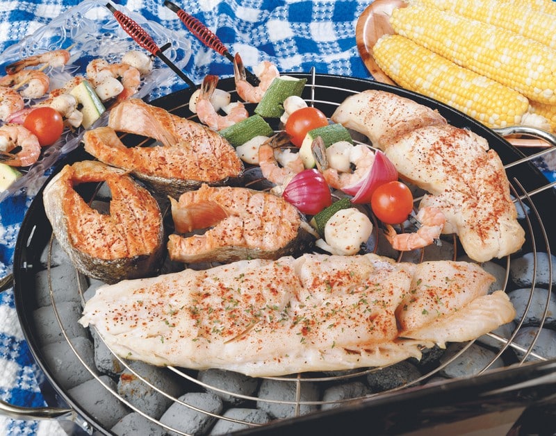 Seafood Assortment Over Coals With Ears Of Corn Food Picture
