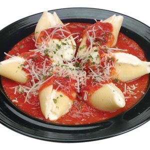 Stuffed Shells in Sauce on Black Plate Food Picture