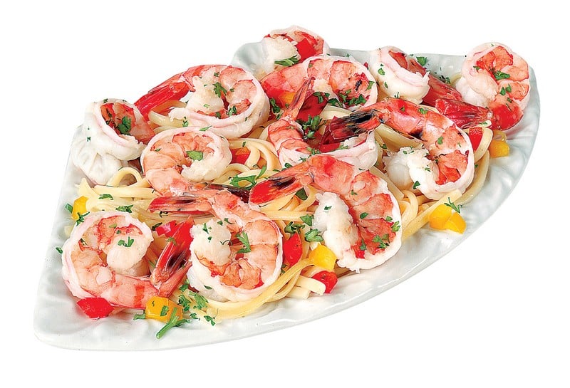 Shrimp over Pasta with Garnish on White Plate Food Picture