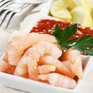 Shrimp Cocktail with Cocktail Sauce and Lemon Food Picture
