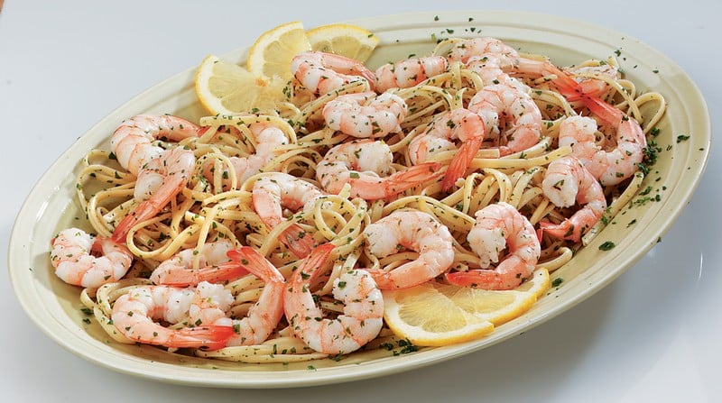 Shrimp over Pasta with Lemon in Light Green Bowl Food Picture