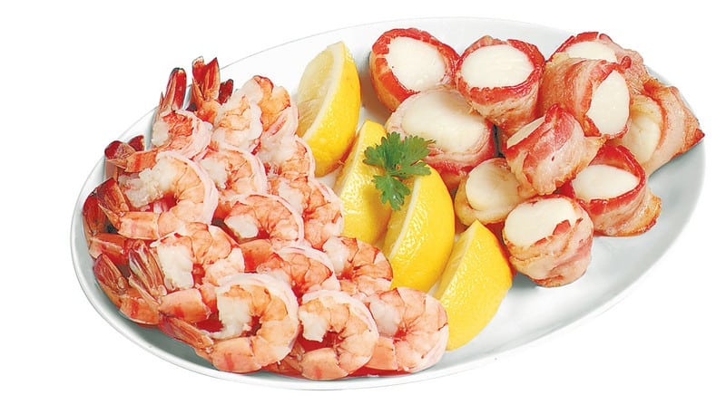 Shrimp and Scallops with Lemon on White Plate Food Picture