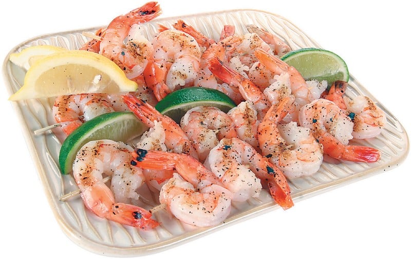 Shrimp Skewers on Plate with Lemons and Limes Food Picture