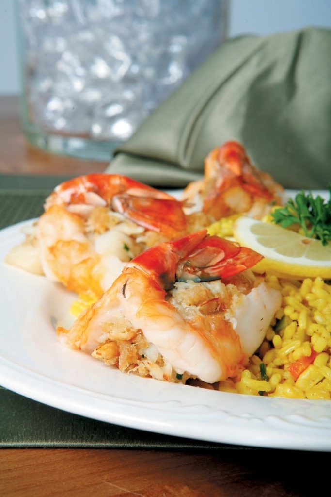 Stuffed Shrimp over Rice on White Plate Food Picture