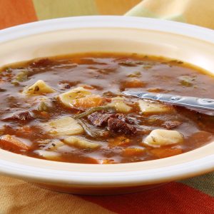 Bowl of Vegetable Beef Soup on Table Food Picture