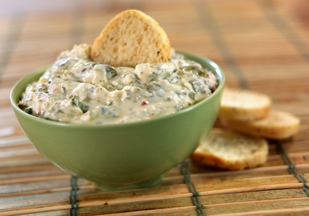 Warm Spinach Artichoke Dip with Baguette Crackers Food Picture