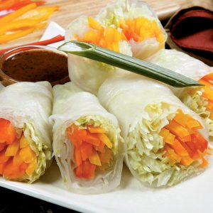 Spring Roll on White Plate with Garnish and Dipping Sauce Food Picture
