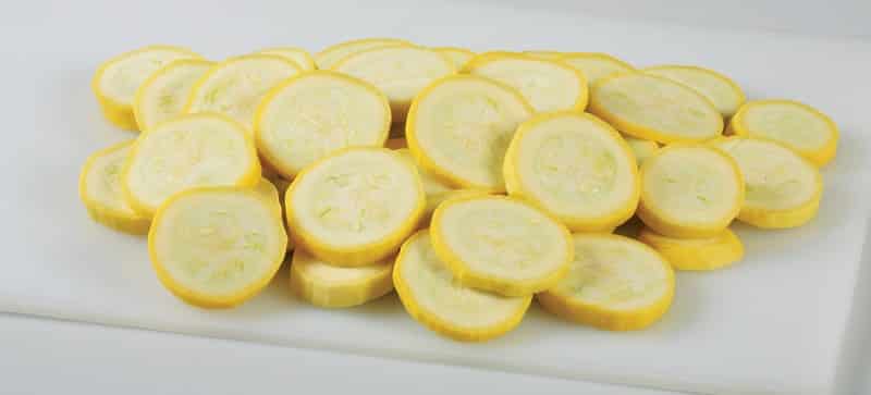 Sliced Summer Squash on White Surface Food Picture