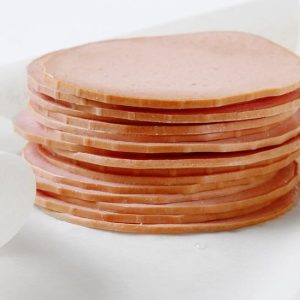 Thick Sliced Deli Fresh Bologna on Wax Wrapping Paper Food Picture