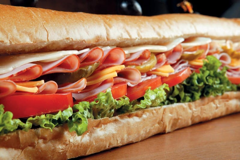 American Cold Cut Sub on Wooden Surface Food Picture