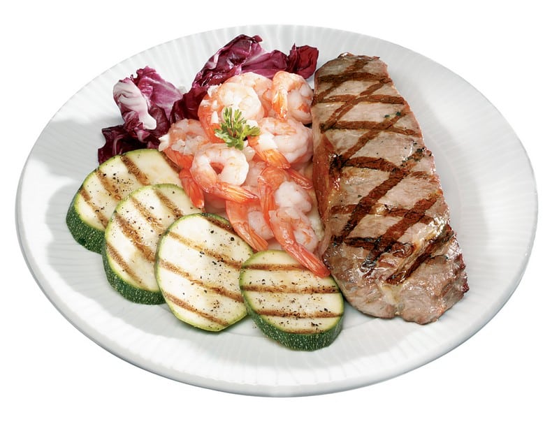 Surf and Turf with Zucchini on White Plate Food Picture