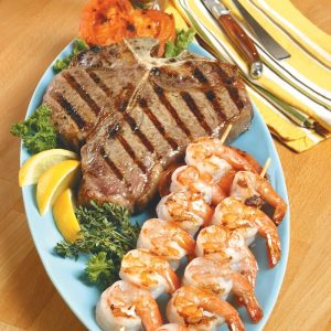 Surf and Turf with Garnish on Light Blue Plate Food Picture