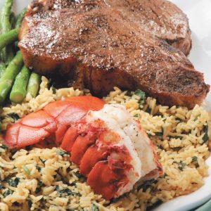 Surf and Turf with Rice and Asparagus on White Dish Food Picture