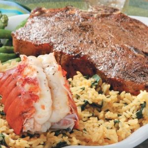 Surf and Turf with Rice and Asparagus on White Plate Food Picture