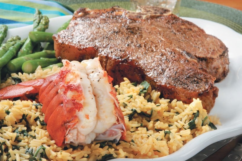 Surf and Turf with Rice and Asparagus on White Plate Food Picture