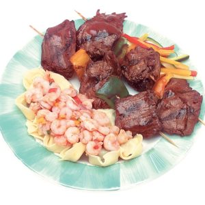 Surf and Turf Skewers with Veggies on Plate Food Picture