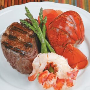 Surf and Turf with Asparagus on White Plate Food Picture