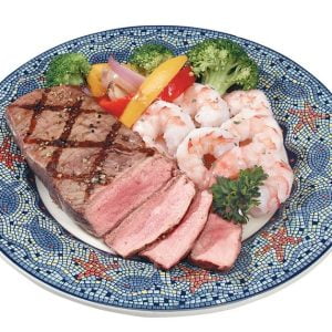 Surf and Turf with Veggies on Decorative Plate Food Picture