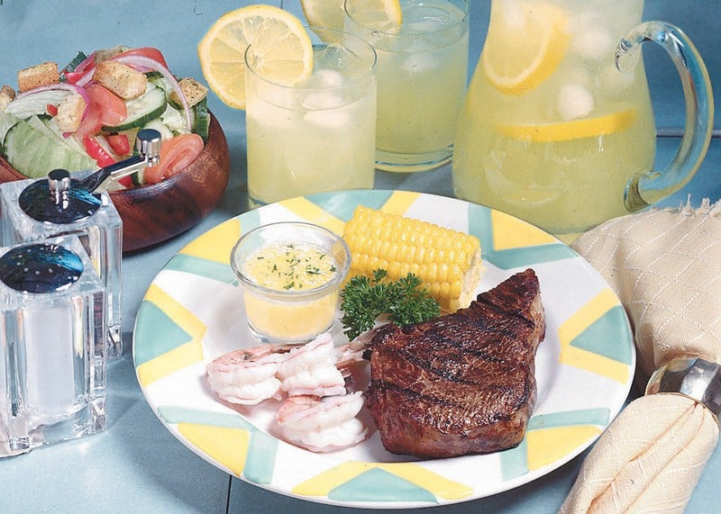Surf and Turf with Butter and Corn on the Cob with Garnish Food Picture