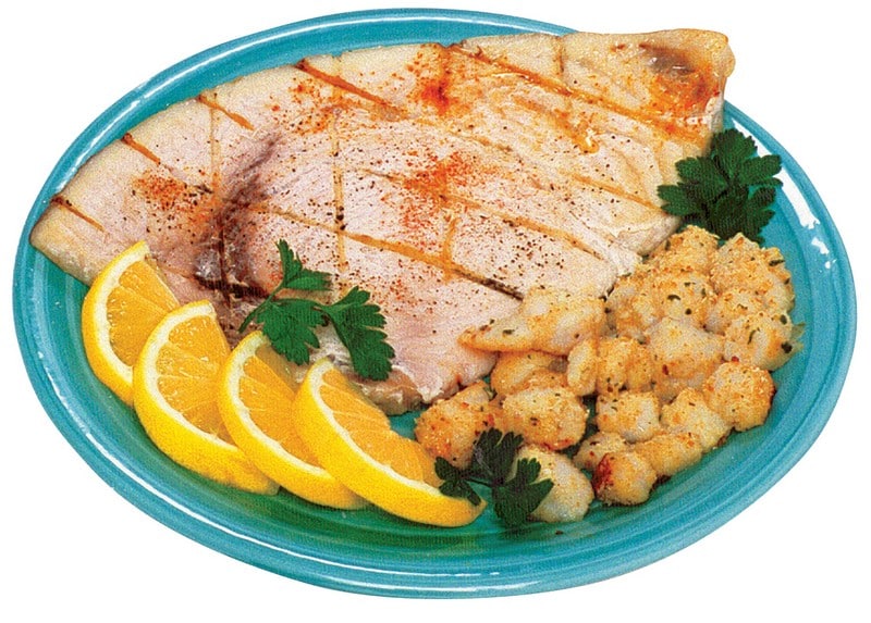 Swordfish with Potatoes and Garnish on Teal Plate Food Picture