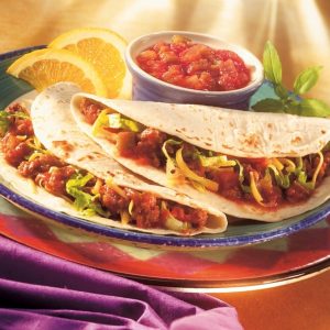 Tacos with Garnish and Dipping Sauce Food Picture