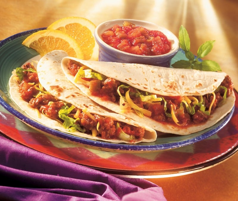 Tacos with Garnish and Dipping Sauce Food Picture